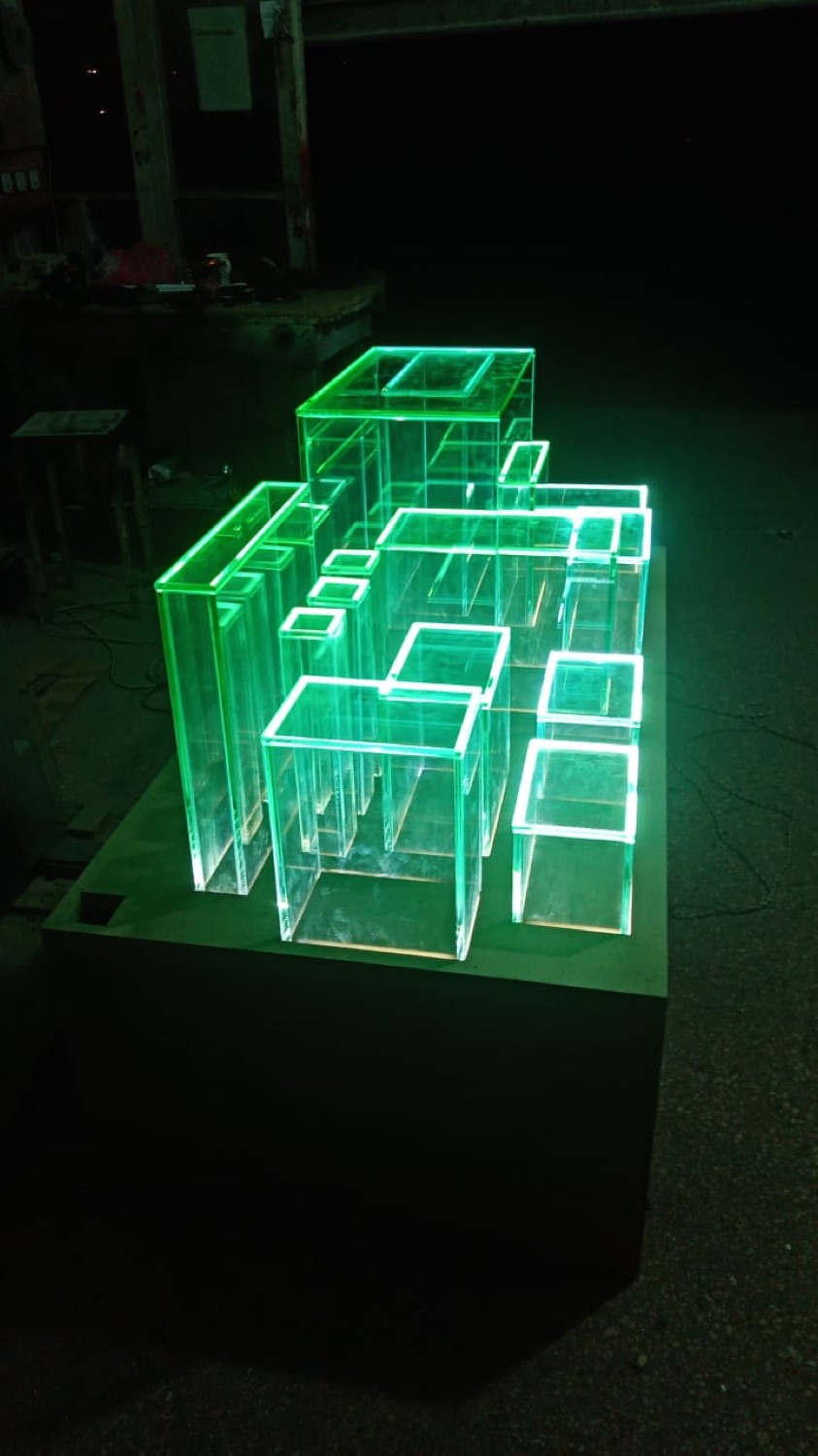 Lit display plinths on the workshop bench