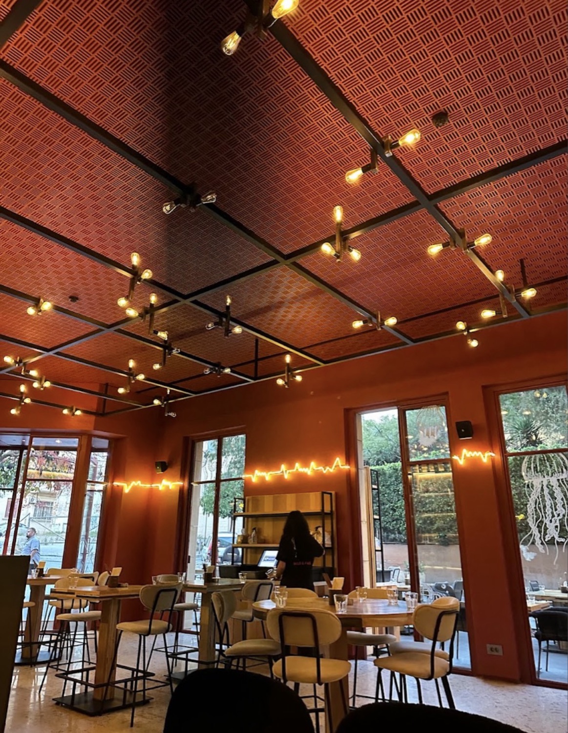 The patterned ceiling and its bulbs