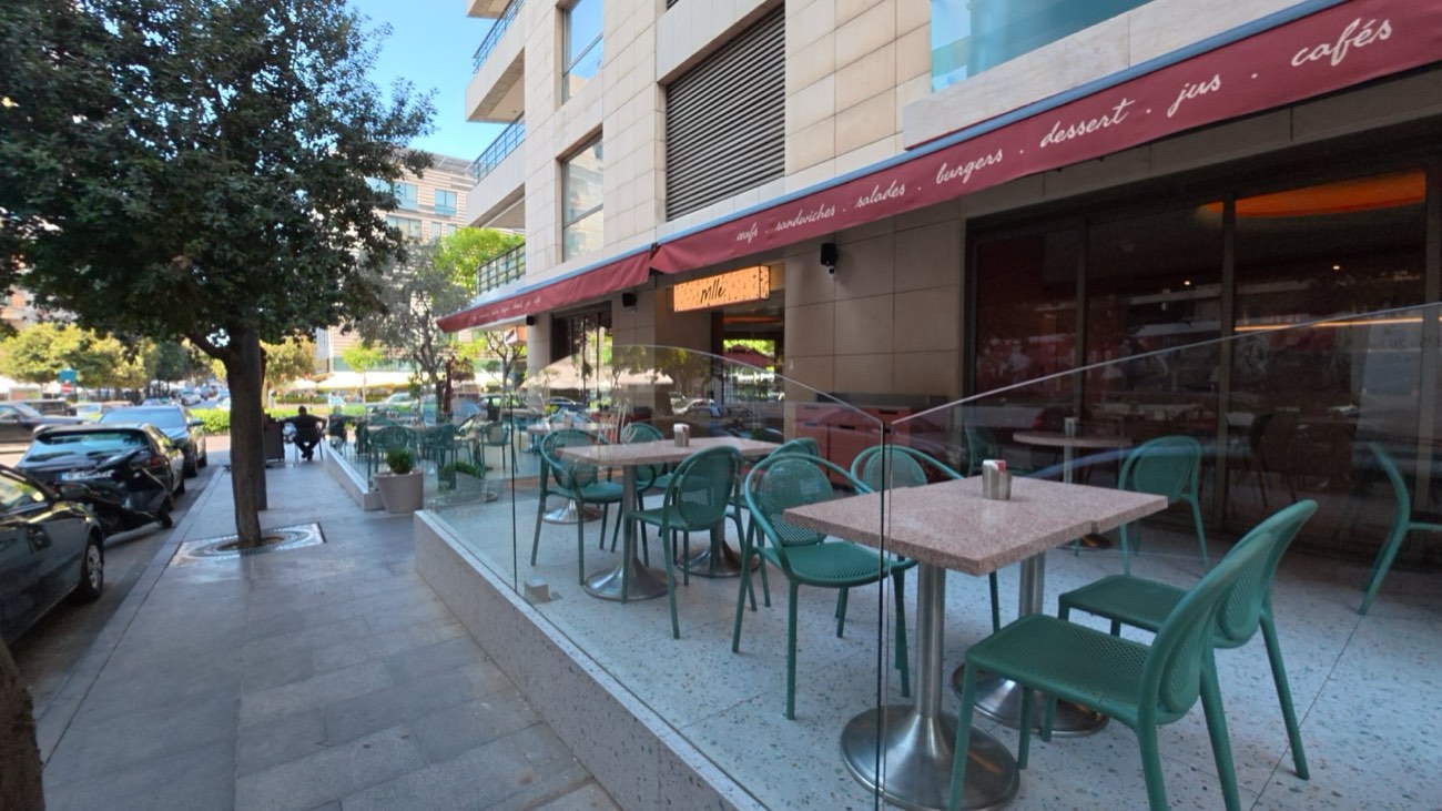 Café frontage with awning and glazed screens